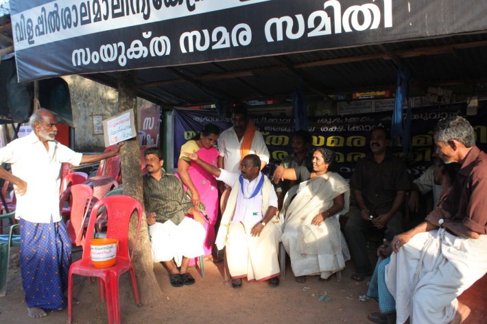 Members of the Vilappilsala panchayat (village council). To protest the garbage they've kept an ongoing hunger strike for over two years.